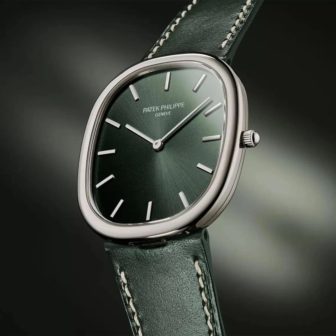 Patek Philippe’s new Golden Ellipse has a dial with an olive-green sunburst finish. 