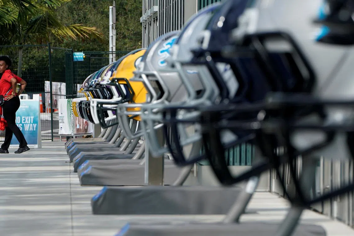 FILE PHOTO: Oversized football helmets surround the convention center as the city hosts Super Bowl LIIV in Miami, Florida, U.S., January 31, 2020. REUTERS/Mike Blake/File Photo