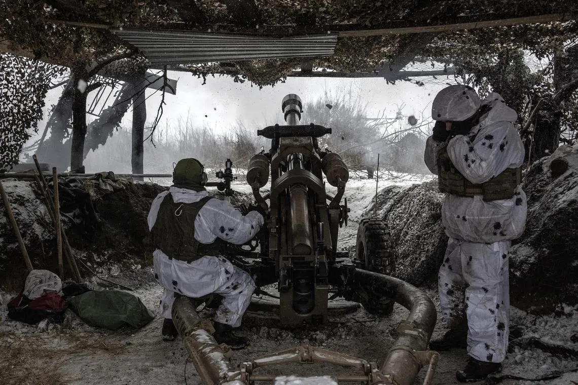 A Ukrainian artillery crew fires towards Russian positions in Ukraine’s eastern Donetsk region.