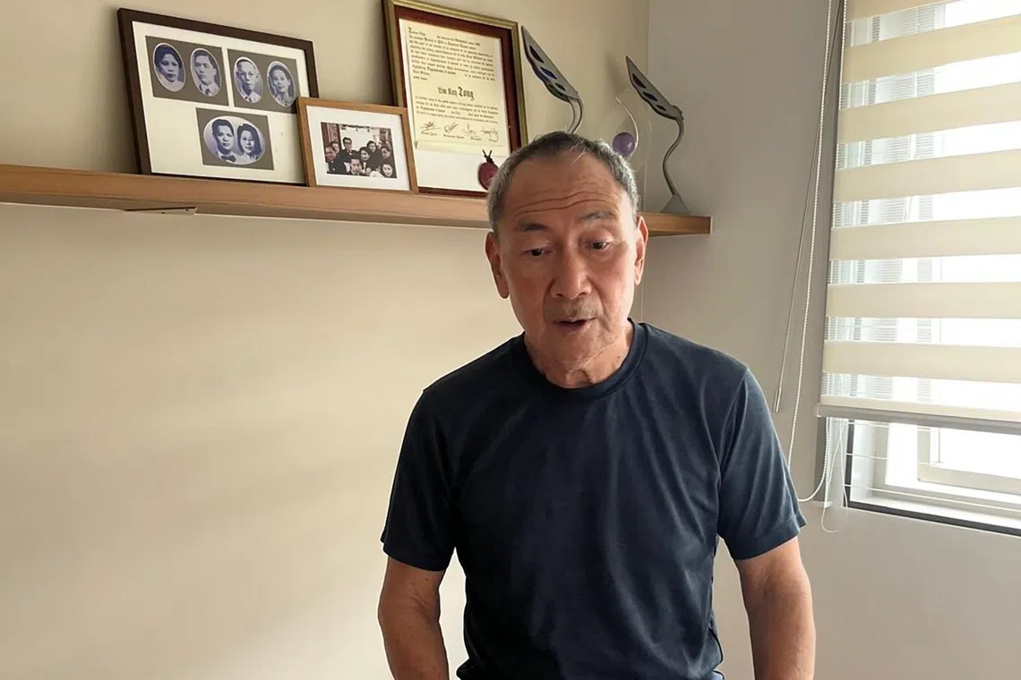 Lim Kay Tong, doing morning exercise on his stationary bicycle. 