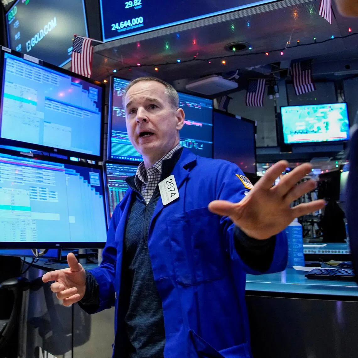 A trader working on the floor of the New York Stock Exchange, in New York City, on Dec 2.
