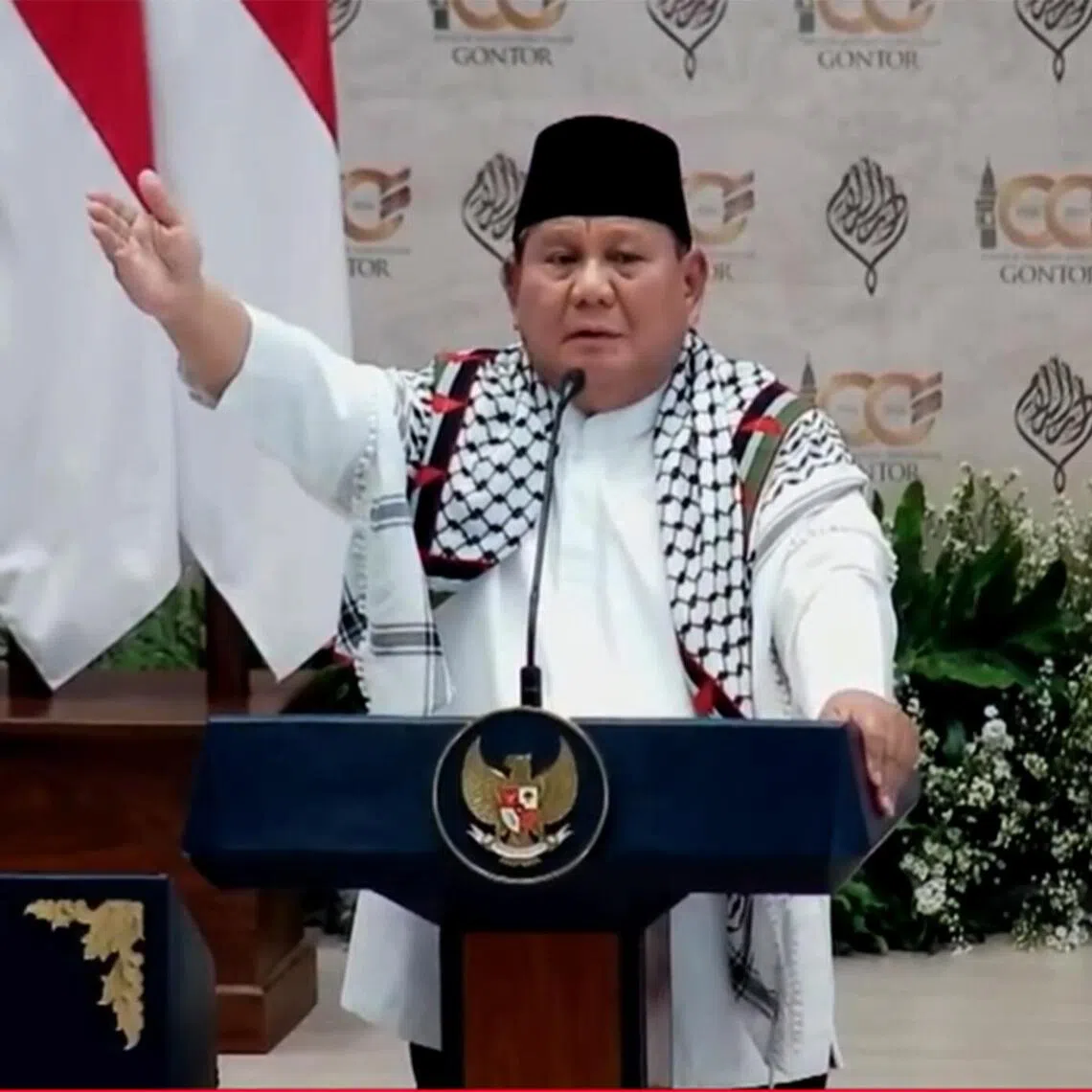 Indonesian President Prabowo Subianto wearing a keffiyeh after leading thousands in chants of “Free Palestine” at the centenary celebrations of the Darussalam Gontor Islamic boarding school on Sept 19.