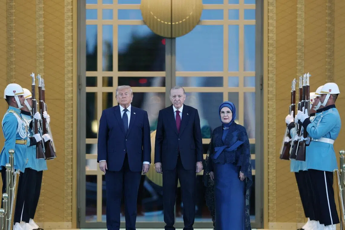 (From left) US President Donald Trump, Turkish President Tayyip Erdogan and his wife Emine Erdogan ahead of the summit in Ankara.