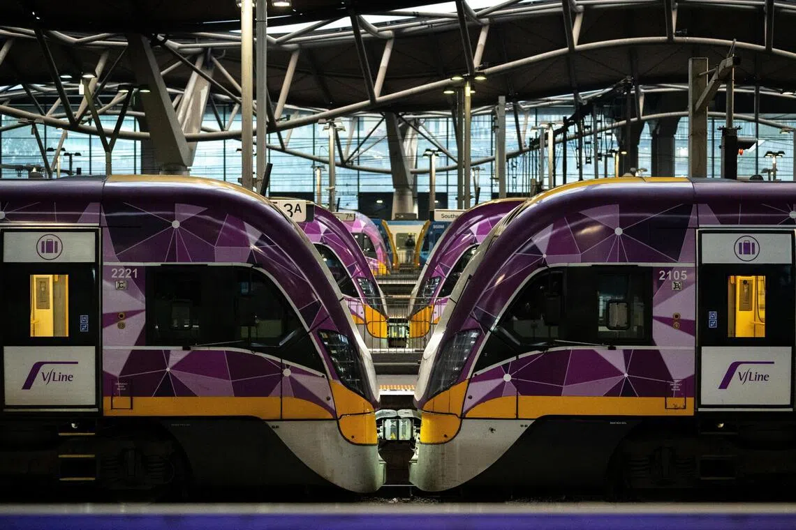 Trains stand at a station in Melbourne following the disruption to passenger rail networks on July 8 due to the Telstra network outage.