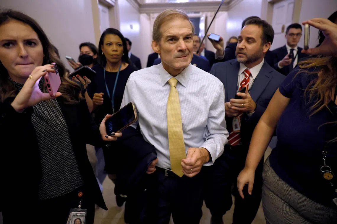 US Representative Jim Jordan is followed by members of the press as he walks through the halls at the US Capitol in Washington, DC.