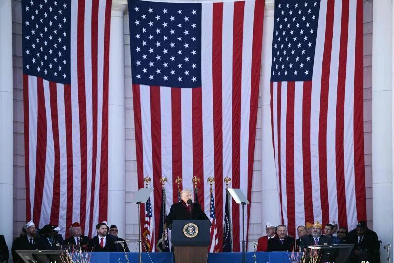 US President Trump at a ceremony honoring veterans in November, at a time when US national security is focused on America First rather than "propping up the entire world order'.