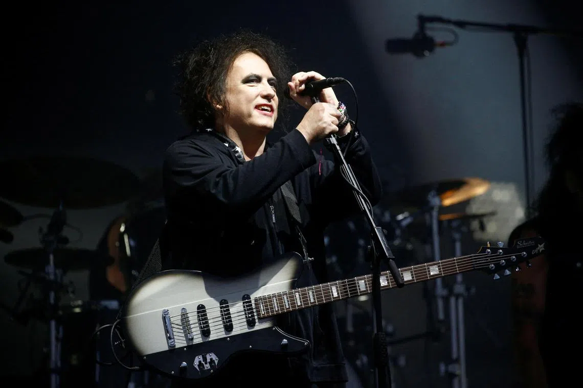 Robert Smith of  British band The Cure performing at the Pyramid Stage closing set during Glastonbury Festival in Somerset in June 2019. 