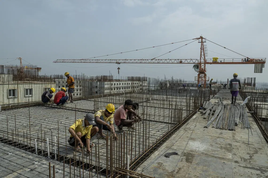 Dormitories being built for workers at Foxconn’s iPhone production complex in Sriperumbudur, India on Jan. 3, 2024. As recently as 2019, 99% of Apple’s iPhones were made in China; last year, 13% were made India, and the company is set to double its production here in Tamil Nadu. (Atul Loke/The New York Times)
