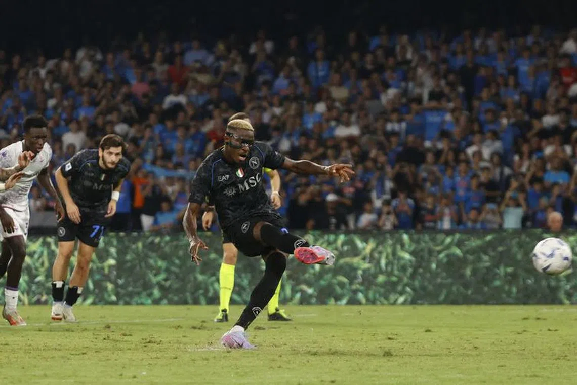 Soccer Football - Serie A - Napoli v Fiorentina - Stadio Diego Armando Maradona, Naples, Italy - October 8, 2023 Napoli's Victor Osimhen scores their first goal from the penalty spot REUTERS/Ciro  De Luca/File Photo