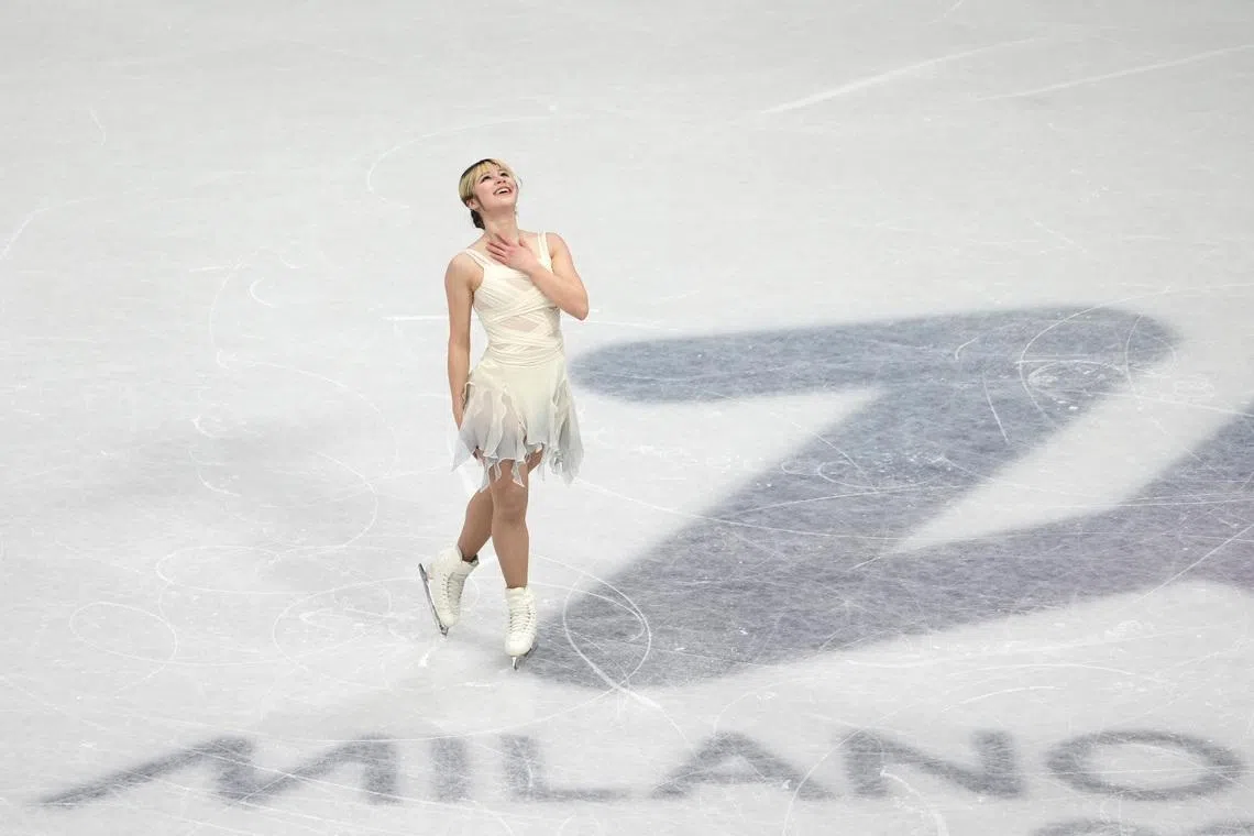 Feb 17, 2026; Milan, Italy; Alysa Liu (24) of the United States competes in the womens figure skating short program during the Milano Cortina 2026 Olympic Winter Games at Milano Ice Skating Arena. Mandatory Credit: James Lang-Imagn Images