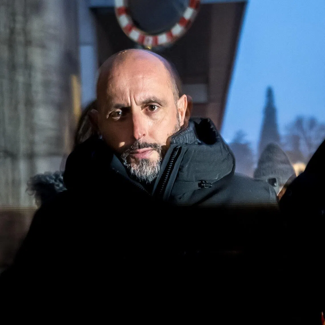 (FILES) Owners of Le Constellation bar Jacques Moretti (L) and Jessica Moretti arrive for a hearing at the Office of the public prosecutor of the Canton of Valais, in Sion, on January 9, 2026. A court in the canton of Valais (south-western Switzerland) ordered on January 23, 2026, the release on bail of Jacques Moretti, co-owner with his wife of the bar in the Crans-Montana ski resort, which was the scene of a deadly fire on New Year's Eve. (Photo by Fabrice COFFRINI / AFP)