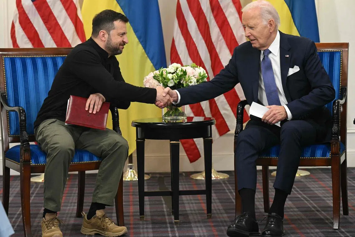 US President Joe Biden (right) met Ukrainian President Volodymyr Zelensky in Paris, on June 7.