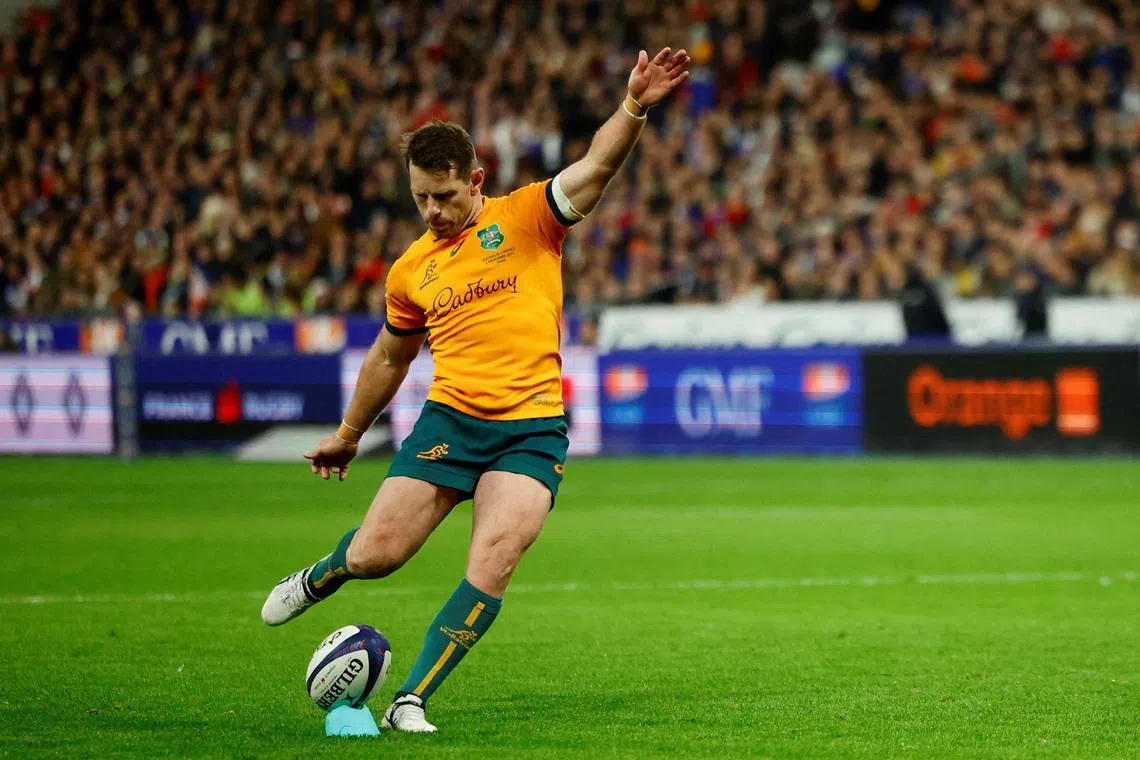 FILE PHOTO: Rugby Union - International - France v Australia - Stade de France, Saint-Denis, France - November 5, 2022  Australia's Bernard Foley kicks a conversion REUTERS/Sarah Meyssonnier/File Photo