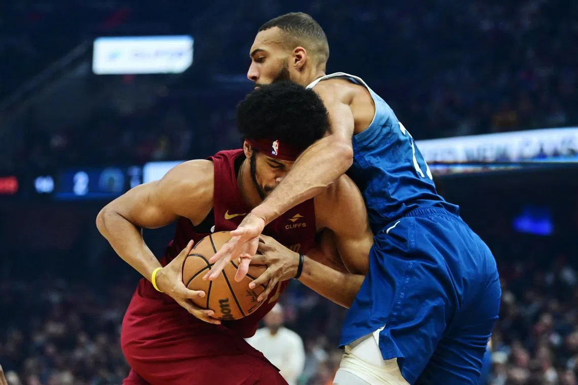 Cleveland Cavaliers centre Jarrett Allen drives to the basket against Minnesota Timberwolves centre Rudy Gobert during the first half at Rocket Mortgage FieldHouse.