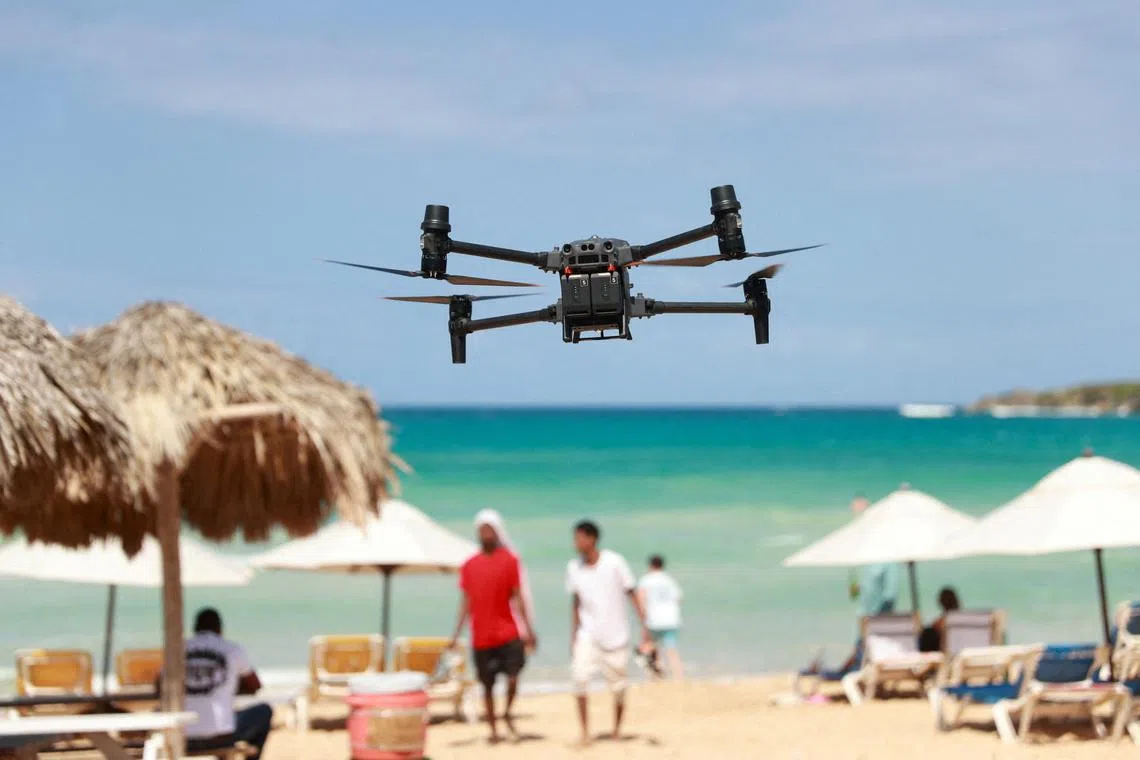 FILE PHOTO: A drone piloted by members of the Armed Forces of the Dominican Republic takes off as part of the ongoing search operation of Sudiksha Chowdary Konanki, 20, an University of Pittsburgh student who went missing while on spring break, in Punta Cana, Dominican Republic March 13, 2025. REUTERS/Erika Santelices/File Photo