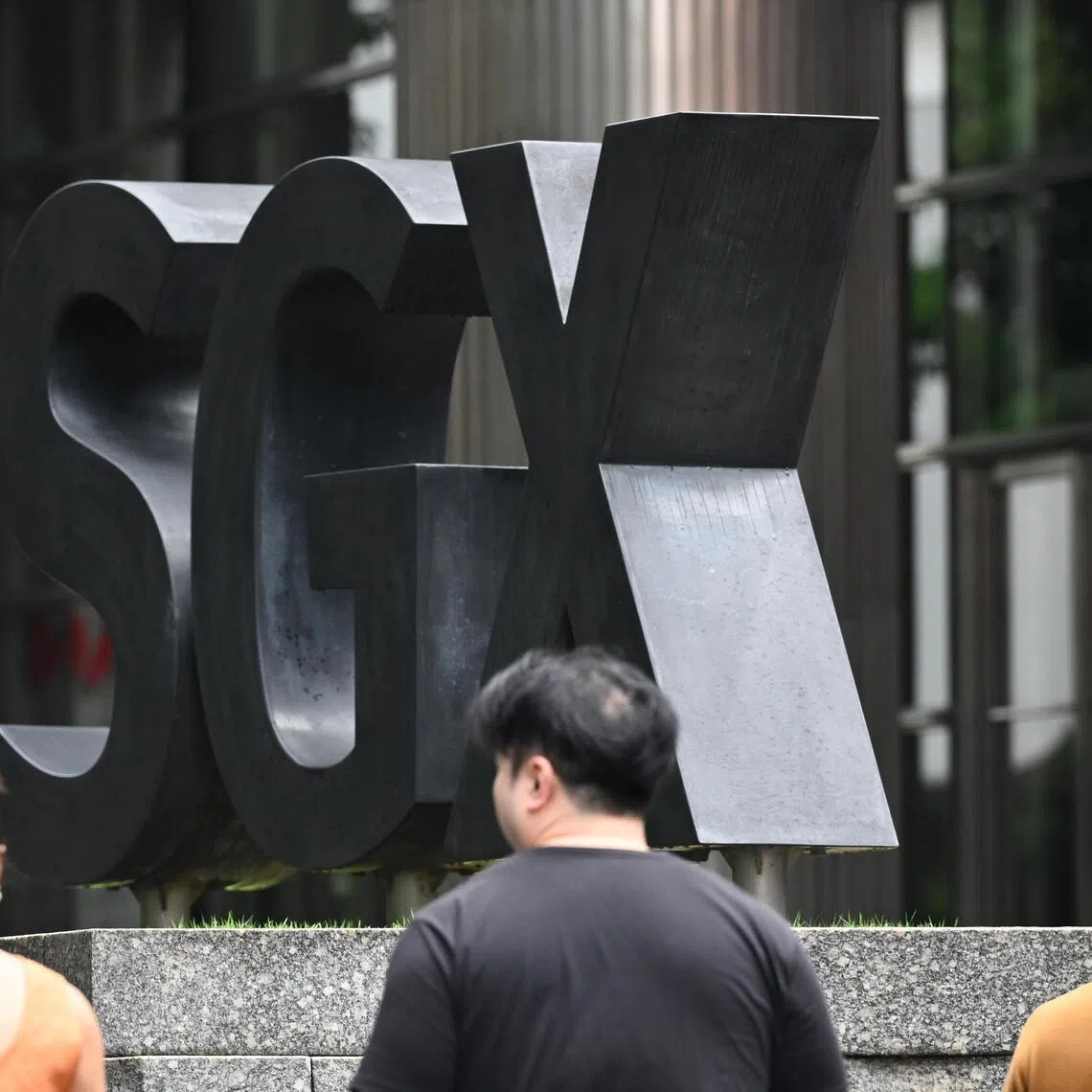 The benchmark Straits Times Index (STI) gained 21.41 points to finish at 4,965.50..