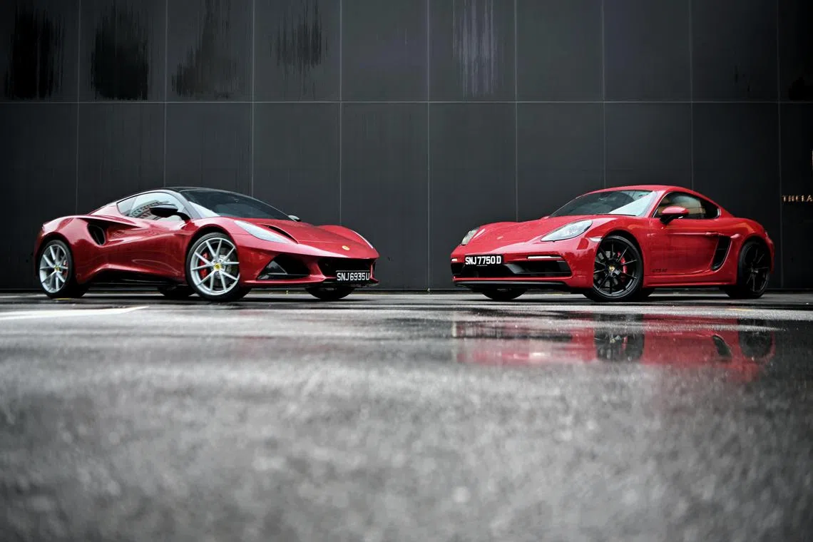 (Left) Lotus Emira vs Porsche Cayman, on Oct 9, 2023.