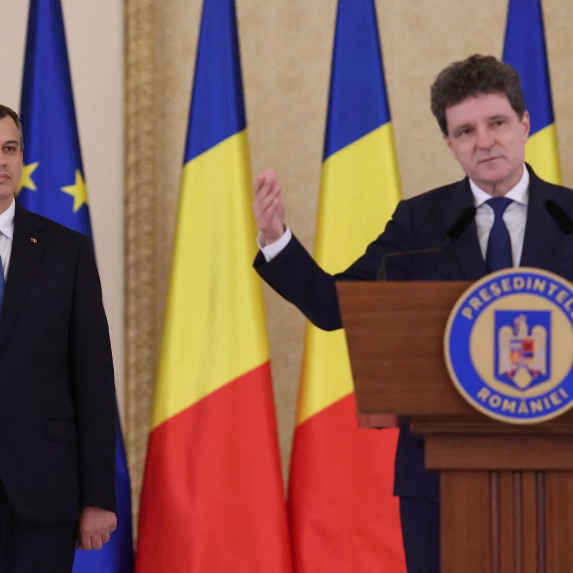 Designated Romanian Prime Minister Eugen Tomac attends a press briefing alongside Romanian President Nicusor Dan, in Bucharest, Romania, June 4, 2026. Inquam Photos/George Calin via REUTERS