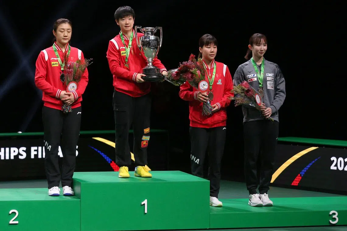 (From left) China's silver medallist Chen Meng, gold medallist Sun Yingsha and bronze medallists Chen Xingtong and Japan's Hina Hayata after the women's singles final at the ITTF World Table Tennis Championships in Durban on May 28, 2023.