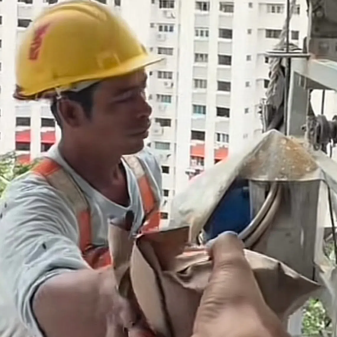 A video of  TikTok user Faisal Marican handing nasi lemak to migrant workers outside his window went viral online.