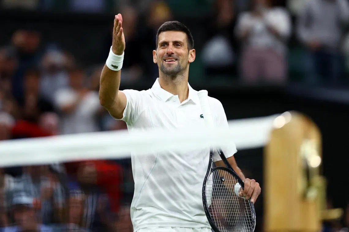 Serbia's Novak Djokovic celebrates winning his third-round match against Australia's Alexei Popyrin.