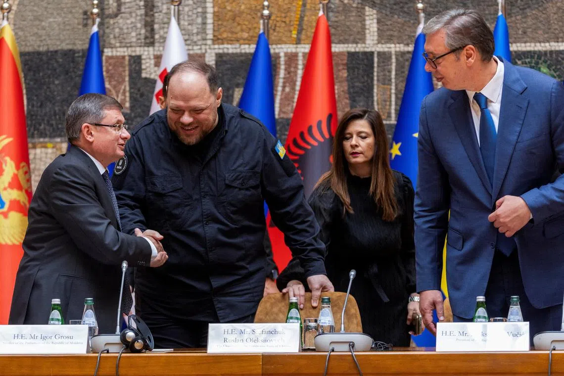 Serbian President Aleksandar Vucic, President of the Parliament of Moldova Igor Grosu and Chairman of the Verkhovna Rada of Ukraine Ruslan Stefanchuk speak at the inaugural meeting of the Speakers of Parliament of EU candidate countries, in Belgrade, Serbia, July 7, 2026. REUTERS/Djordje Kojadinovic