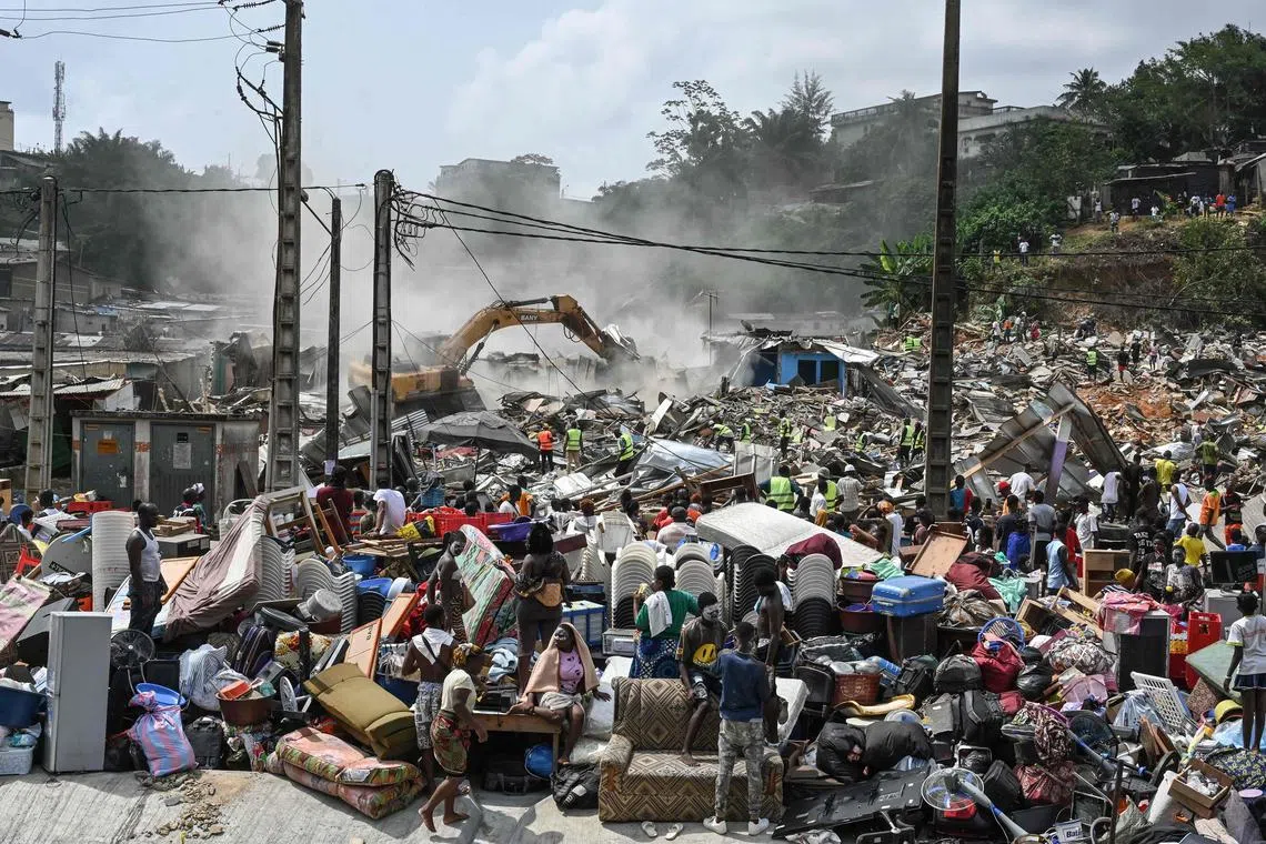 Bulldozers demolishing houses in Banco, Abidjan on Feb 25, 2024. The governor of the Abidjan district initiated an operation to demolish high-risk neighbourhoods in the city 