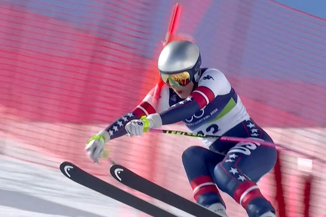 This handout video grab from IOC/OBS shows Lindsey Vonn crashing during the women's downhill event at the Winter Olympic Games in Cortina d’Ampezzo.