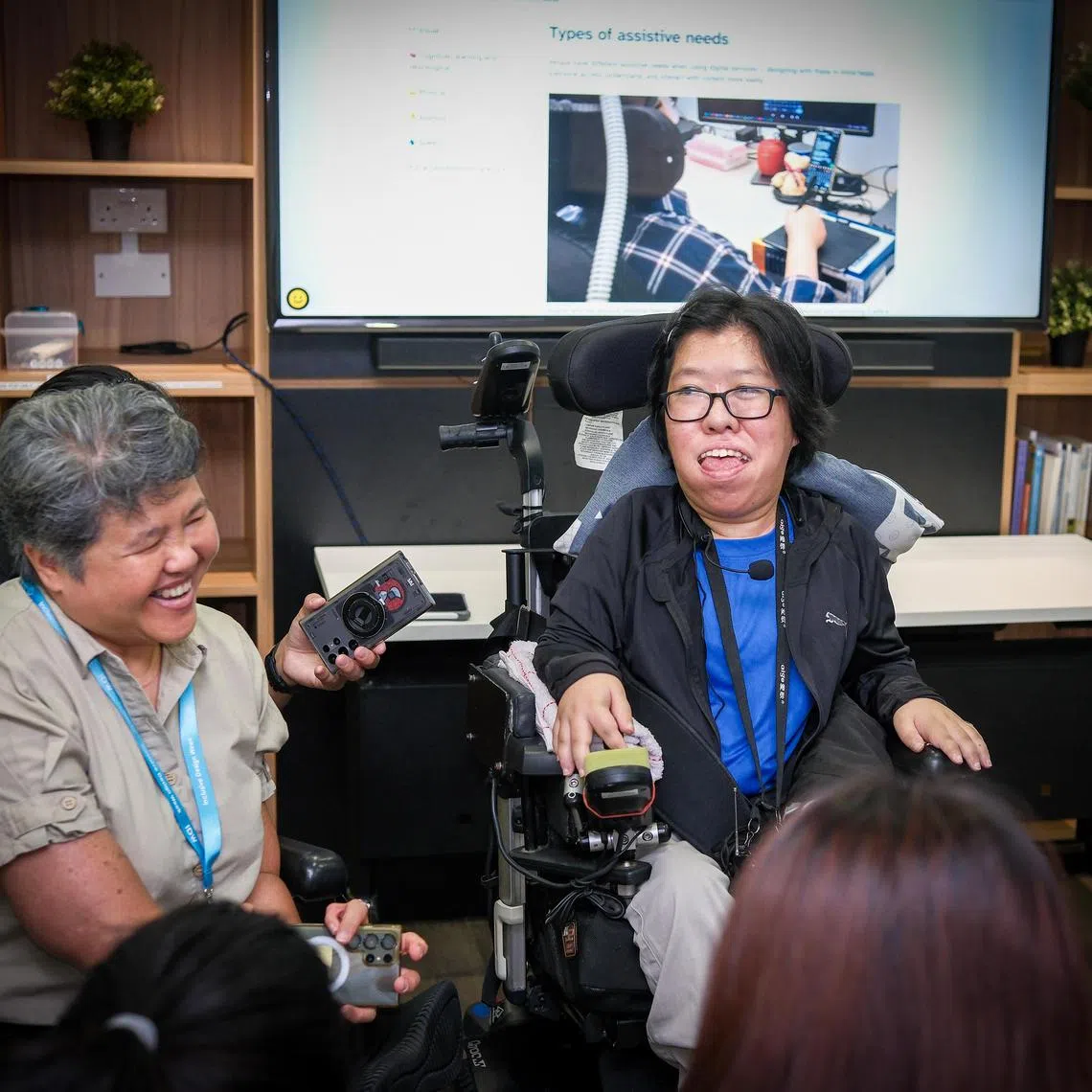 (L-R) Muscular Dystrophy Association (Singapore) (MDAS) executive director Ms Judy Wee and MDAS member Ms Jasmin Yau speaking to reporters at the launch of Inclusive Design Week 2025 and A11y Playground on July 29, 2025 at the Enabling Village. 