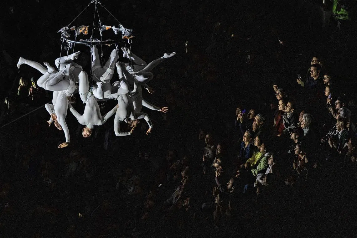 Dancers performing in the show 'Aria' by the Spanish company Zenit Aerial Ballet during the 2nd International Festival of Living Arts (FIAV) in Bogota, Colombia on March 29, 2026. 