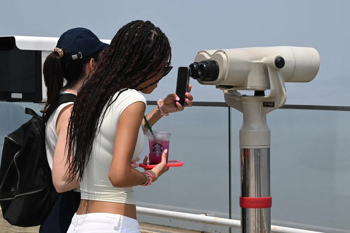 Perched on a hilltop beneath the Aegibong Peace Ecopark observatory where telescopes peek into the secluded state, the shop has drawn tens of thousands from South Korea and abroad since opening in November 2024.