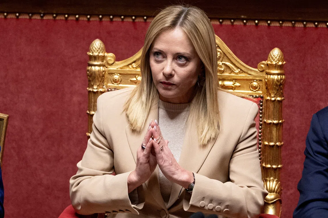 FILE PHOTO: Italy's Prime Minister Giorgia Meloni gestures as she appears at the Senate, ahead of the European Council in Brussels, in Rome, Italy, October 22, 2025. REUTERS/Remo Casilli/File Photo