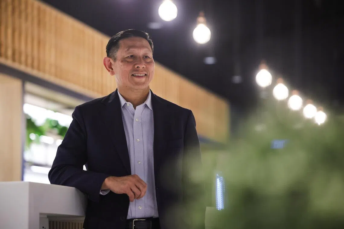Singtel Singapore CEO flying the national flag high after bidding goodbye to corporate America