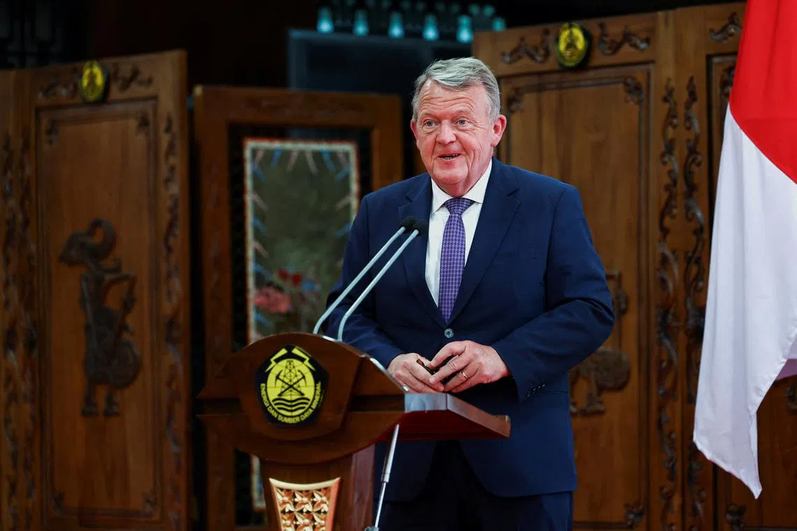 FILE PHOTO: Danish Foreign Minister Lars Lokke Rasmussen delivers his speech during a signing ceremony for a Memorandum of Understanding (MoU) concerning renewable and clean energy and energy conservation, in Jakarta, Indonesia April 21, 2025. REUTERS/Willy Kurniawan/File Photo