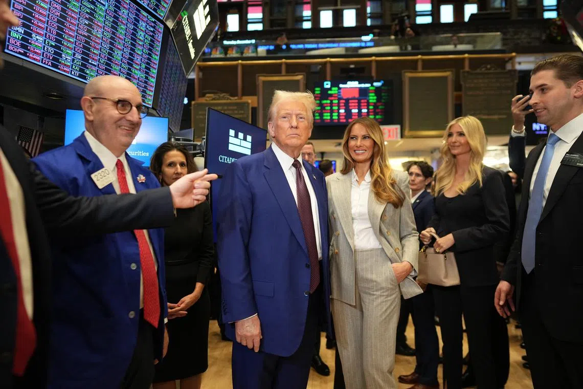 US President-elect Donald Trump and his wife Melania Trump visiting the New York Stock Exchange on Dec 12.