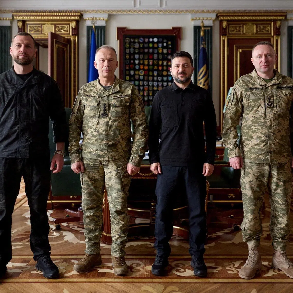 Ukrainian President Volodymyr Zelensky (second from left), with (from left) new army chief Mykhailo Drapatyi, his predecessor Oleksandr Syrskyi, and Acting Defence Minister Yevhenii Khmara.
