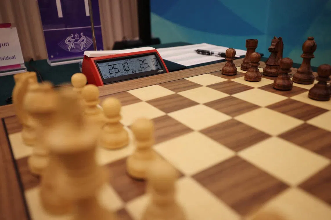 FILE PHOTO: Asian Games - Hangzhou 2022 - Chess - Hangzhou Qi-Yuan (Zhili) Chess Hall, Hangzhou, China - September 24, 2023 General view of chessboard during Women's Individual Round 1 REUTERS/Stanley Cheah/File Photo