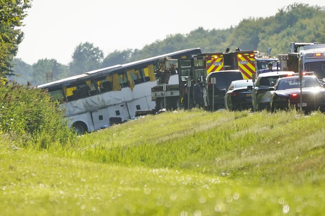 A tour bus, righted by a tow truck, after a rollover crash on the New York State Thruway in Pembroke, New York, on Aug 22. The tour bus was travelling from Niagara Falls to New York City.