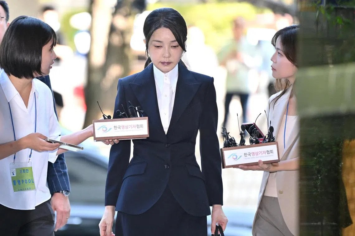 FILE PHOTO: South Korea's former first lady Kim Keon Hee, wife of impeached former president Yoon Suk Yeol, arrives at a court to attend a hearing to review her arrest warrant requested by special prosecutors at the Seoul Central District Court, in Seoul, South Korea August 12, 2025.     JUNG YEON-JE/Pool via REUTERS/File Photo