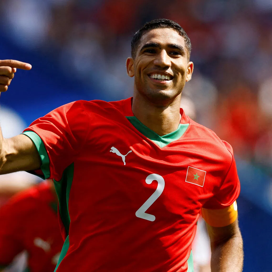 FILE PHOTO: Paris 2024 Olympics - Football - Men's Quarter-final - Morocco vs United States - Parc des Princes, Paris, France - August 02, 2024. Achraf Hakimi of Morocco celebrates scoring their third goal. REUTERS/Piroschka Van De Wouw/File Photo
