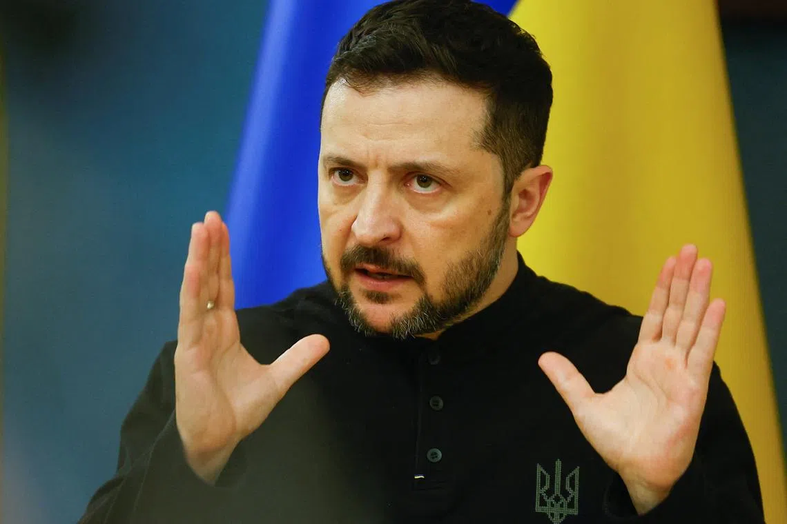 FILE PHOTO: Ukraine's President Volodymyr Zelenskiy speaks during a press conference, amid Russia's attack on Ukraine, in Kyiv, Ukraine March 25, 2025. REUTERS/Valentyn Ogirenko/File photo
