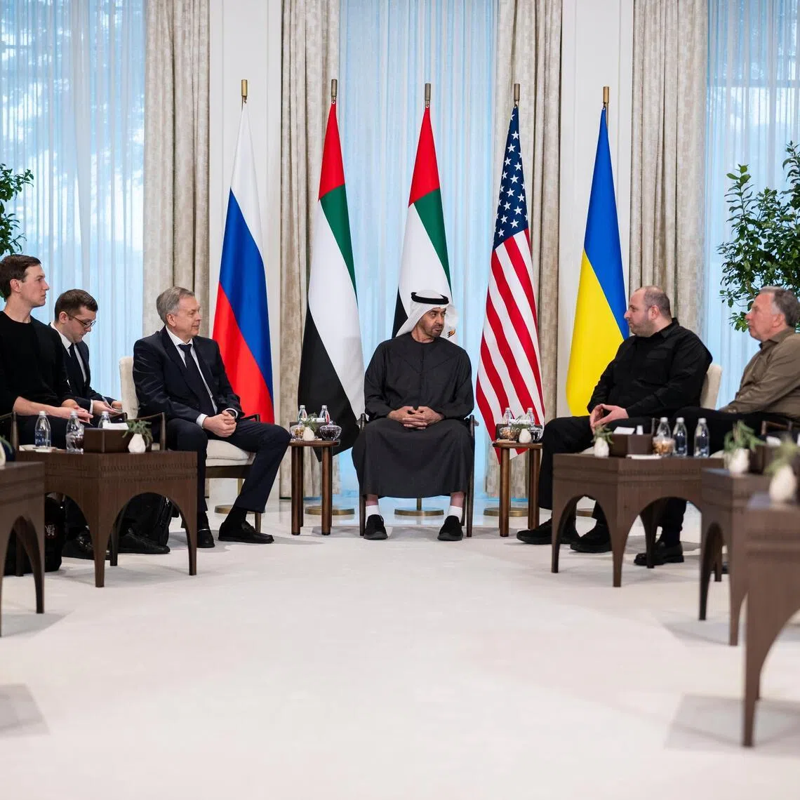 Negotiators from Russia, Ukraine and the US meeting in Abu Dhabi on Jan 23.