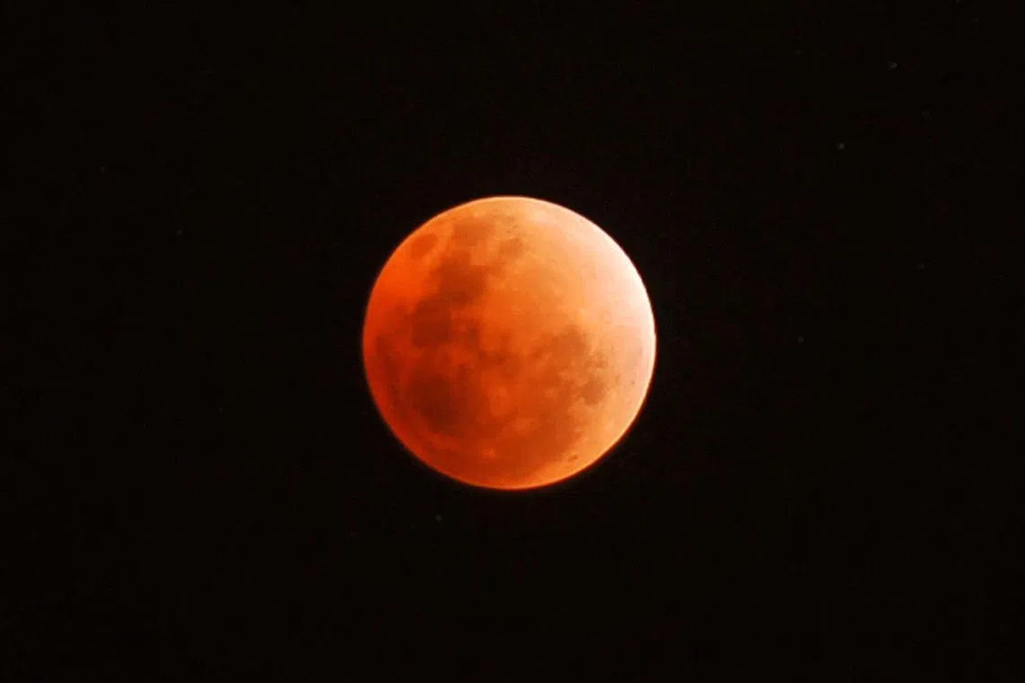 A red moon during a total lunar eclipse on Dec 10, 2011 .