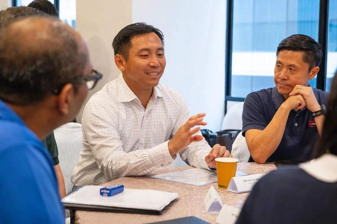 Mr Goh Pei Ming, Senior Minister of State for Ministry of Social and Family Development and Christian Chao, Chief Executive Officer of Care Corner Singapore.