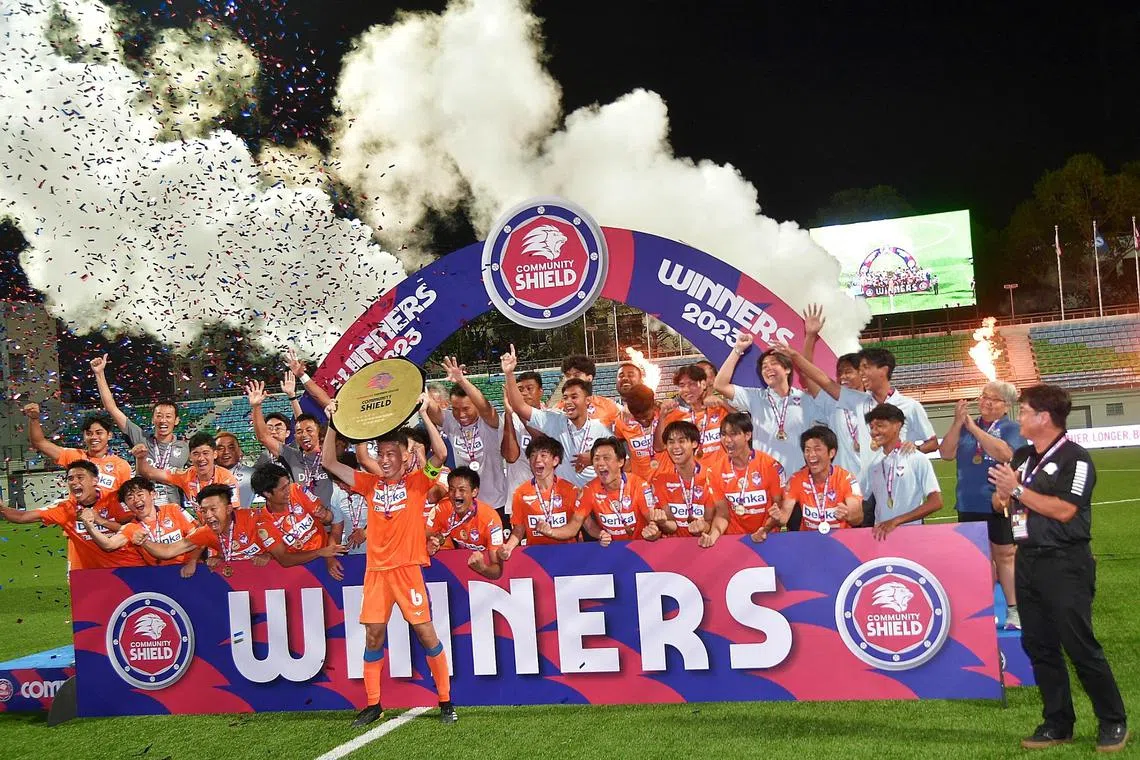 Albirex Niigata captain Asahi Yokokawa lifting the Singapore Community Shield after their 3-0 win over Hougang United on Feb 19.
