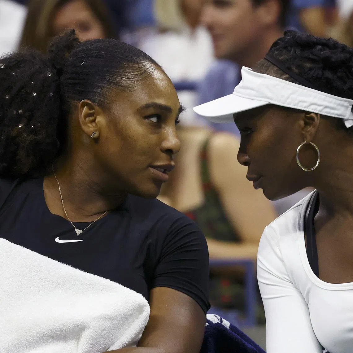 FILE PHOTO: Tennis - U.S. Open - Flushing Meadows, New York, United States - September 1, 2022  Venus Williams and Serena Williams of the U.S. during their women's doubles first round match against Czech Republic's Linda Fruhvirtova and Lucie Hradecka REUTERS/Mike Segar/File Photo