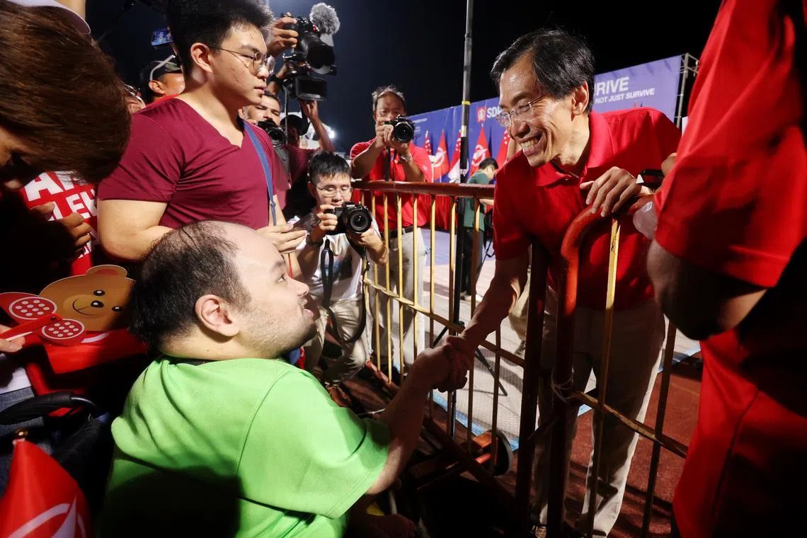 SDP chief Chee Soon Juan meeting supporters after the party's rally at Choa Chu Kang Stadium on April 24.