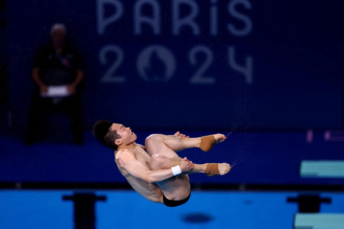 Paris 2024 Olympics - Diving - Men's 3m Springboard Semifinal - Aquatics Centre, Saint-Denis, France - August 07, 2024. Zongyuan Wang of China in action. REUTERS/Hannah Mckay