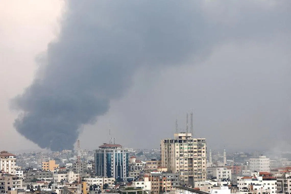 Smoke rises following Israeli strikes in Gaza, October 9, 2023. REUTERS/Mohammed Salem