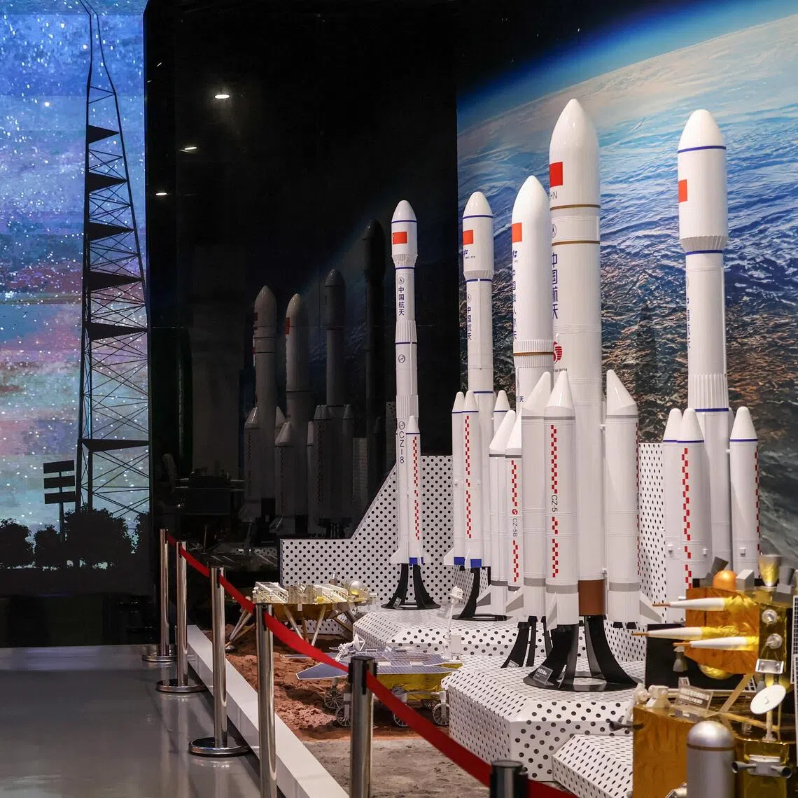 Models of Chinese space vehicles at a museum in Haikou, Hainan, on Aug 23. The unmanned Chang’e-7 spacecraft was expected to search for frozen water near the moon’s south pole.